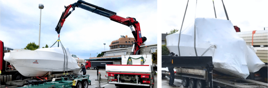 LKW Kran im Einsatz bei einem Motorboot Spezialtransport